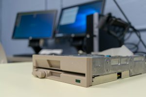 Portrait view a floppy drive on a table.